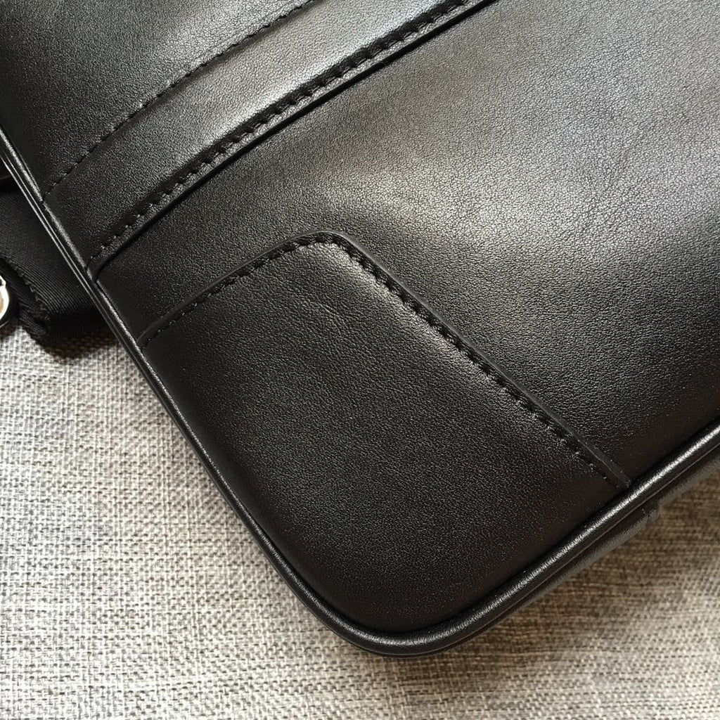 PRADA EMBOSSED LOGO BRIEFCASE 38 IN BLACK SMOOTH CALFSKIN