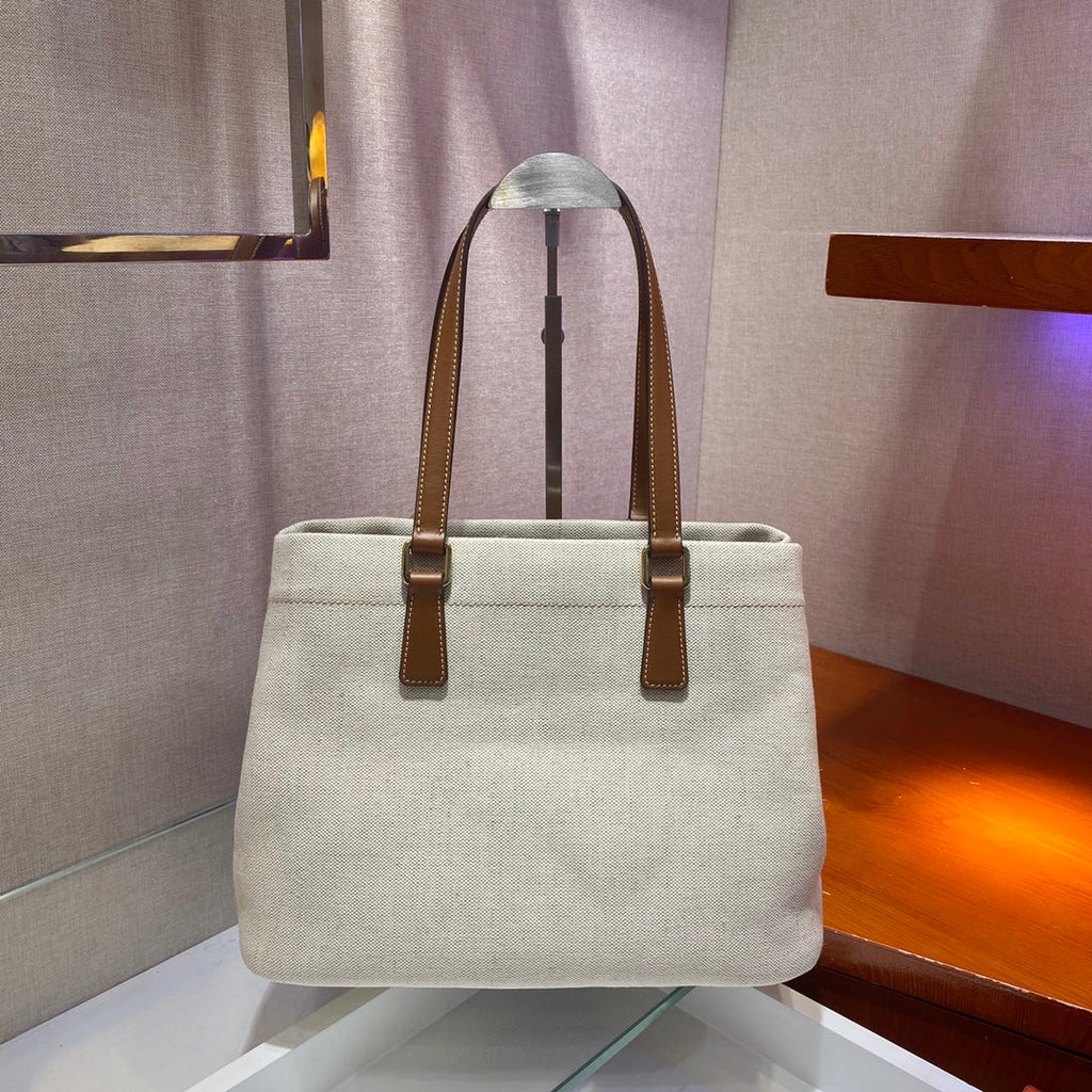 PRADA TOTE BAG 33 IN WHITE CANVAS AND BROWN CALFSKIN HANDLE