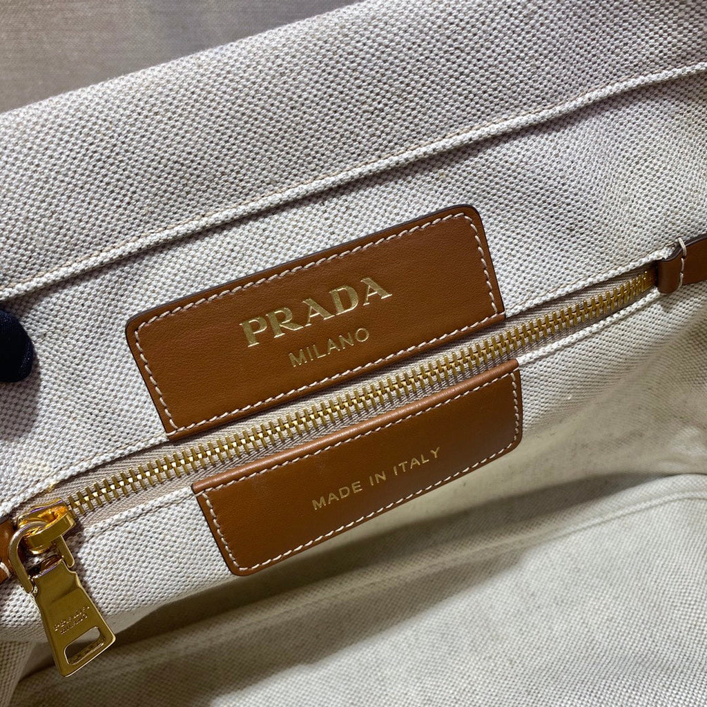 PRADA TOTE BAG 33 IN WHITE CANVAS AND BROWN CALFSKIN HANDLE