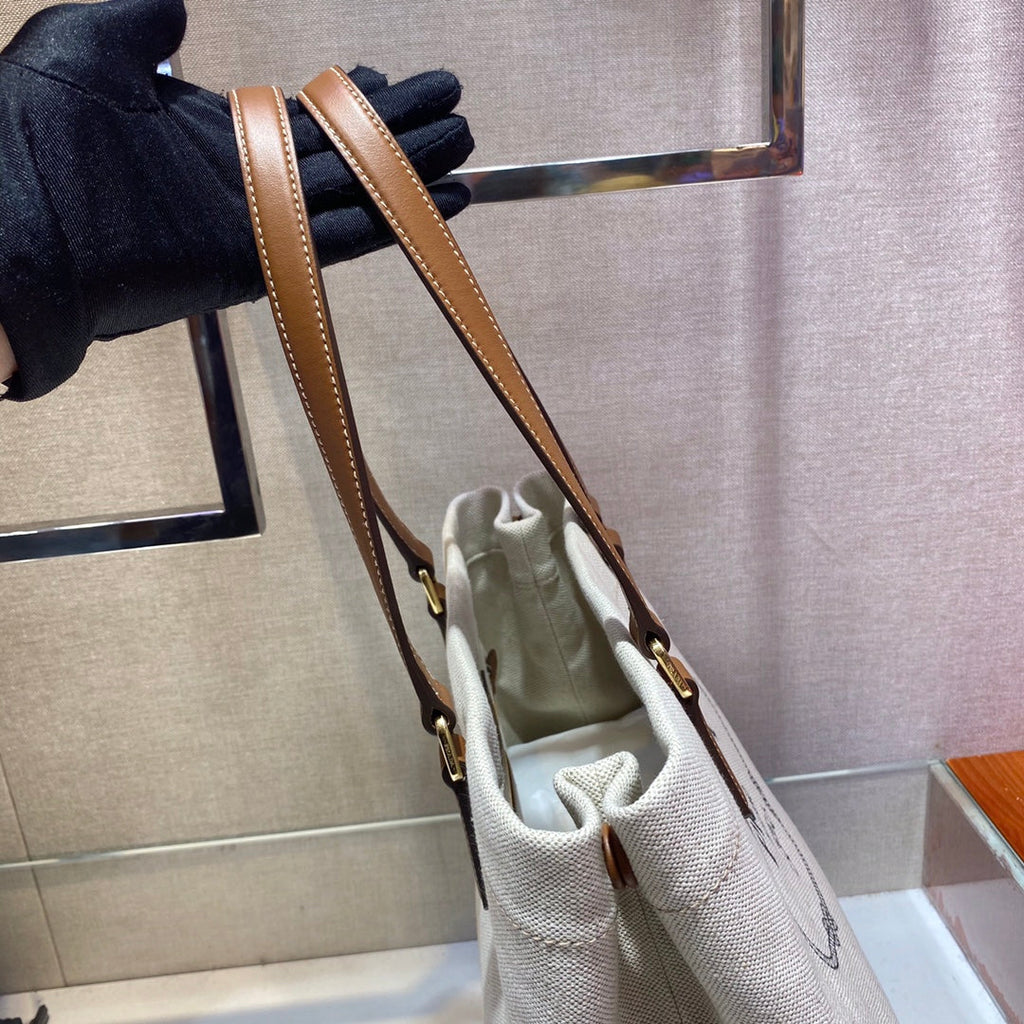 PRADA TOTE BAG 33 IN WHITE CANVAS AND BROWN CALFSKIN HANDLE
