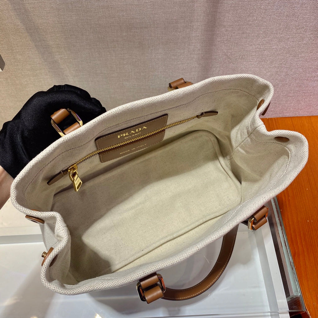 PRADA TOTE BAG 33 IN WHITE CANVAS AND BROWN CALFSKIN HANDLE