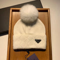 PRADA BEANIE HAT IN WHITE WOOL AND RABBIT FUR 361435