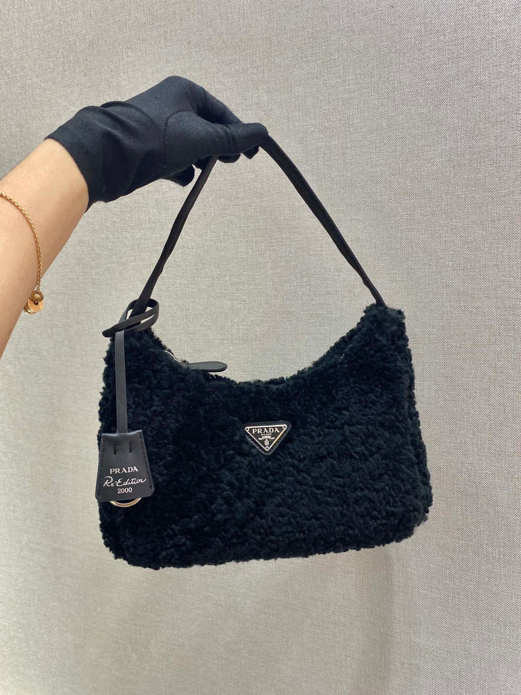 PRADA HOBO BAG 23 IN BLACK SHEARLING