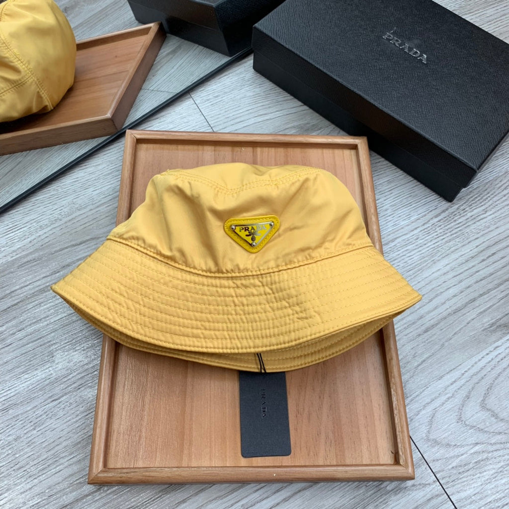 PRADA BUCKET HAT IN GOLDEN YELLOW RE-NYLON 234109