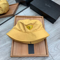 PRADA BUCKET HAT IN GOLDEN YELLOW RE-NYLON 234109