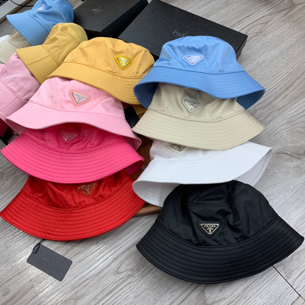 PRADA BUCKET HAT IN GOLDEN YELLOW RE-NYLON 234109