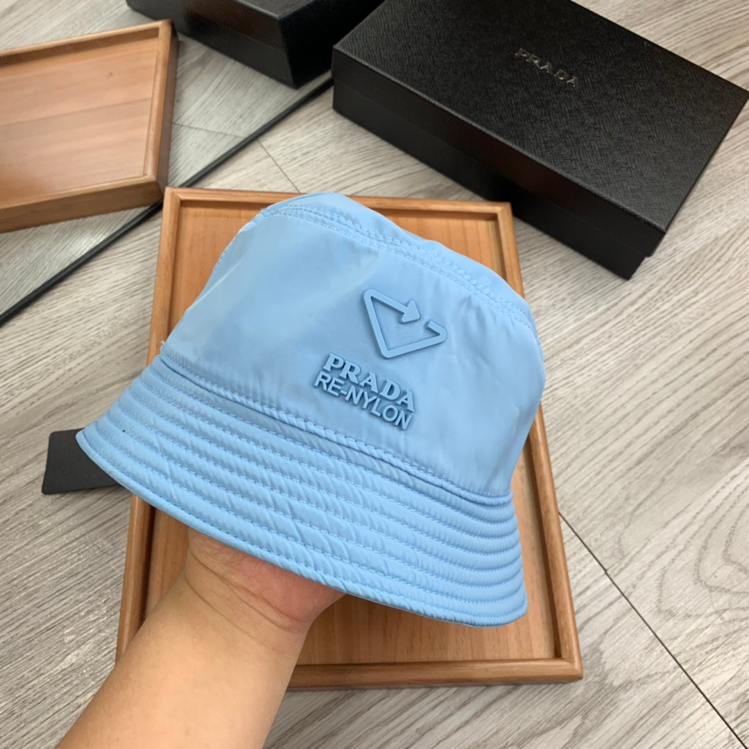 PRADA BUCKET HAT IN CERULEAN BLUE RE-NYLON 234101