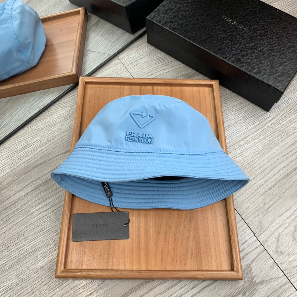 PRADA BUCKET HAT IN CERULEAN BLUE RE-NYLON 234101