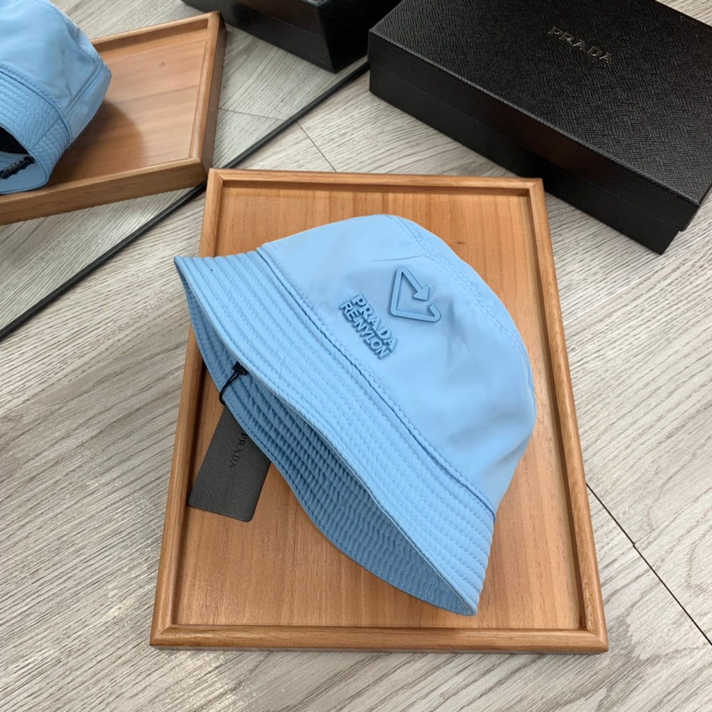 PRADA BUCKET HAT IN CERULEAN BLUE RE-NYLON 234101