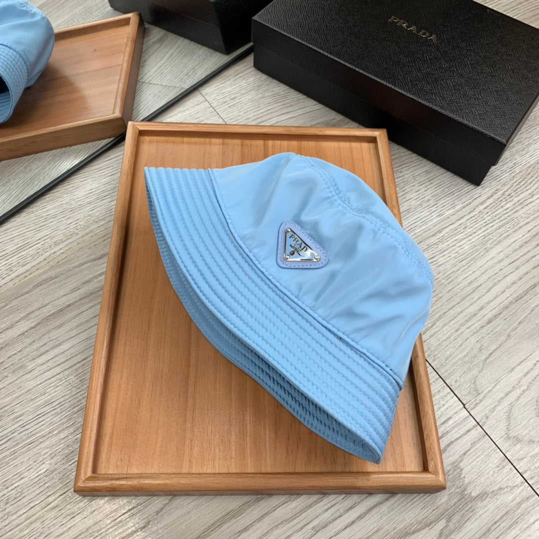 PRADA BUCKET HAT IN CERULEAN BLUE RE-NYLON 234101