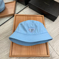 PRADA BUCKET HAT IN CERULEAN BLUE RE-NYLON 234101