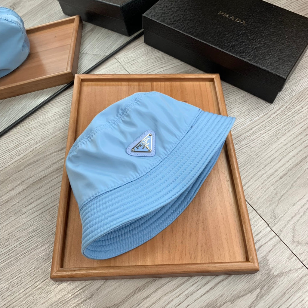PRADA BUCKET HAT IN CERULEAN BLUE RE-NYLON 234101