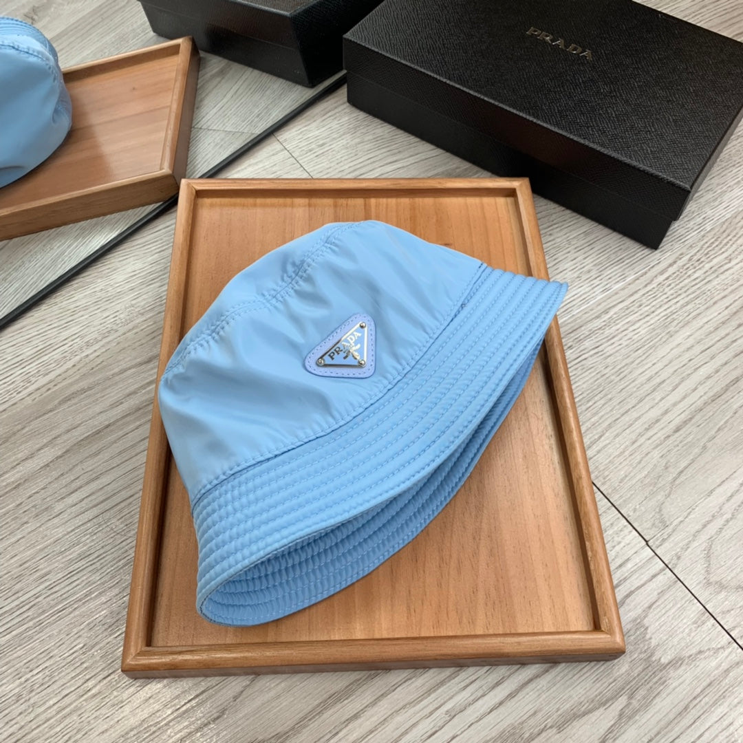 PRADA BUCKET HAT IN CERULEAN BLUE RE-NYLON 234101