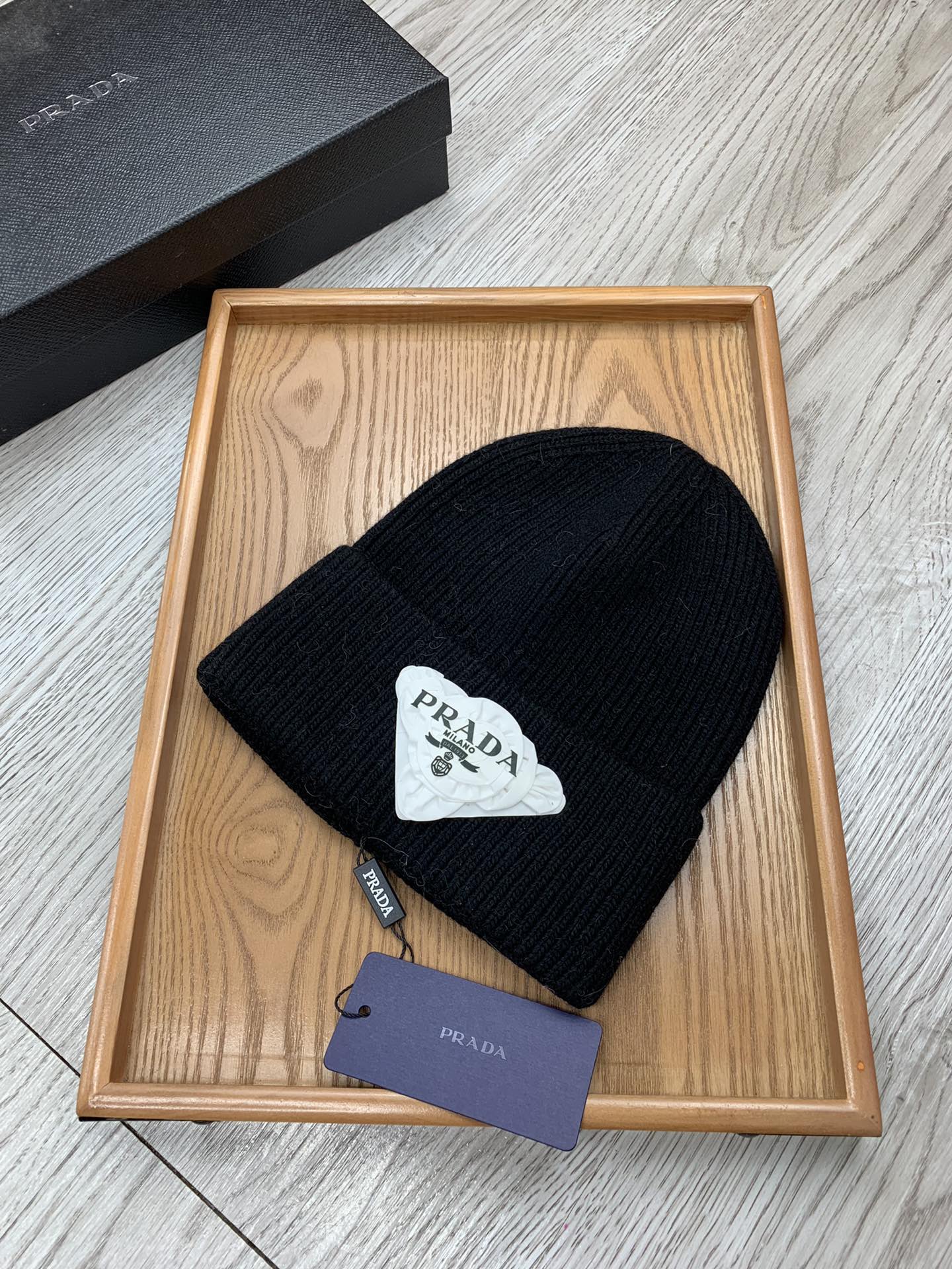 PRADA BEANIE HAT IN BLACK WOOL 431357