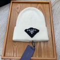 PRADA BEANIE HAT IN WHITE WOOL 431356