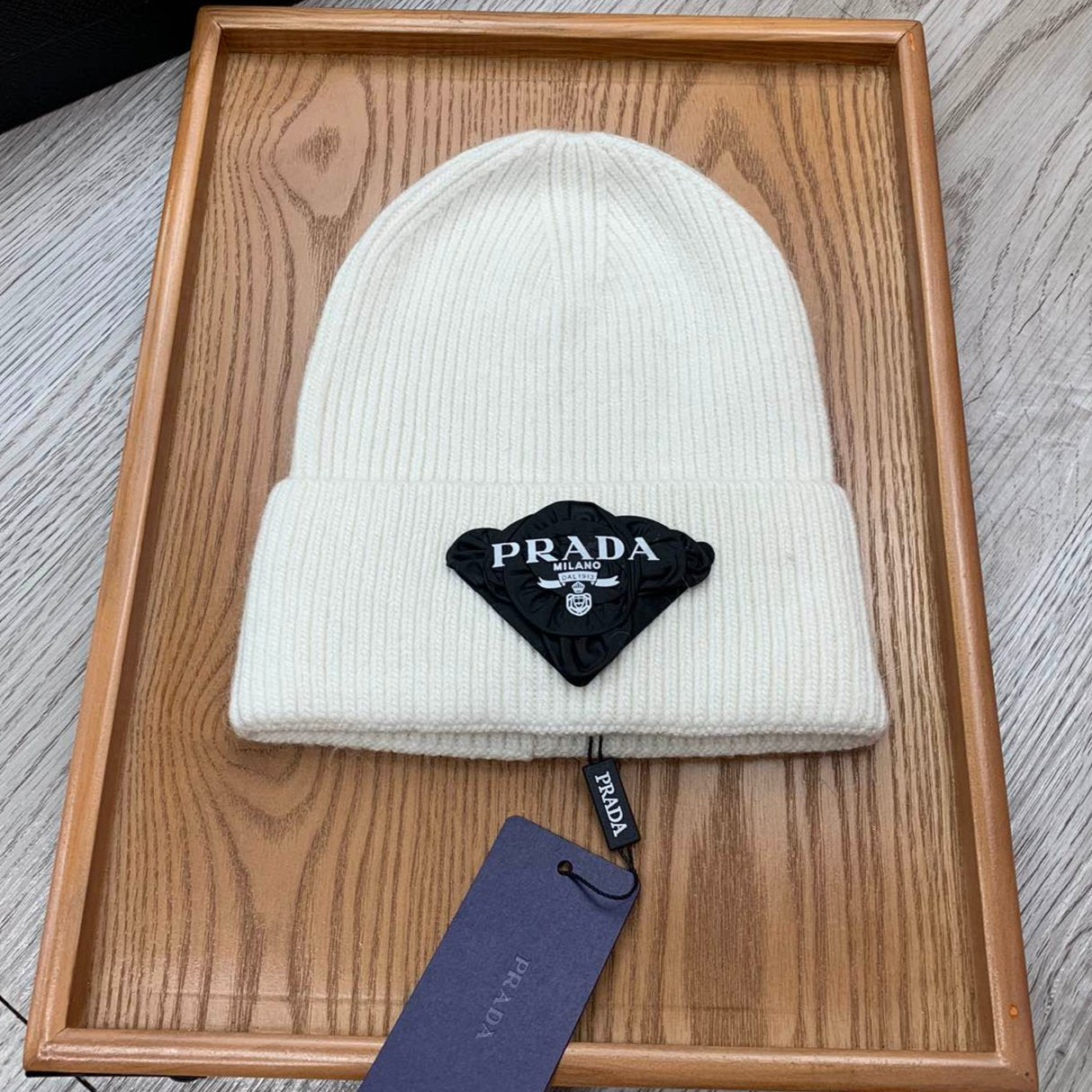 PRADA BEANIE HAT IN WHITE WOOL 431356