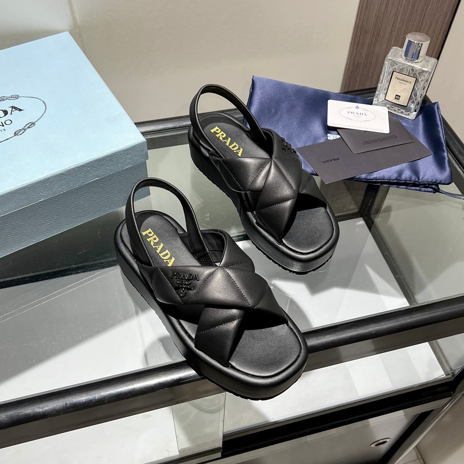 PRADA PADDED CRISSCROSS SANLS BLACK LAMBSKIN