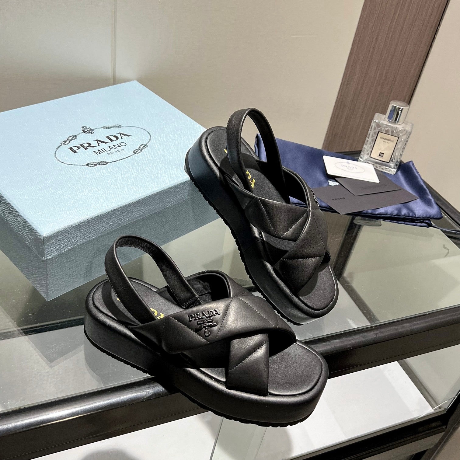 PRADA PADDED CRISSCROSS SANLS BLACK LAMBSKIN