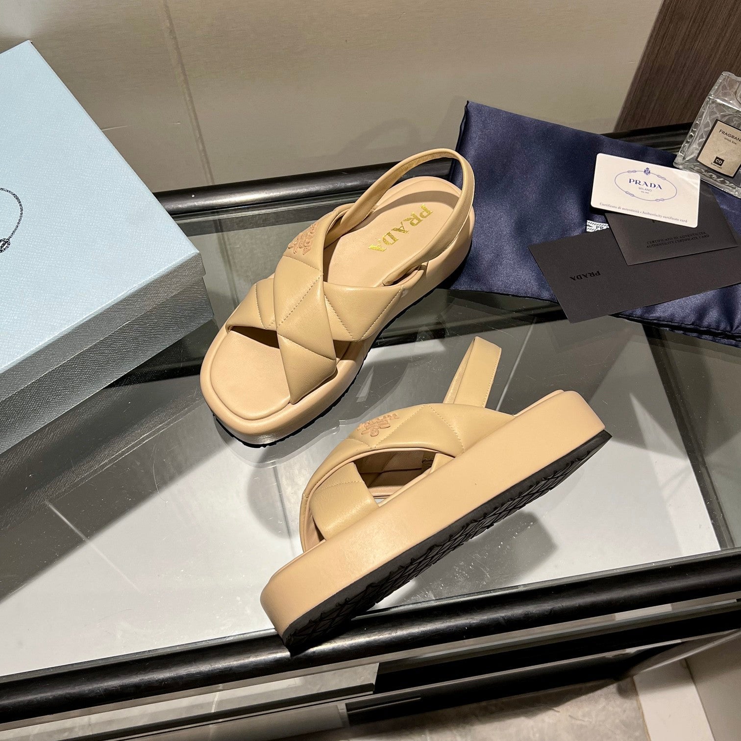 PRADA PADDED CRISSCROSS SANLS BEIGE LAMBSKIN