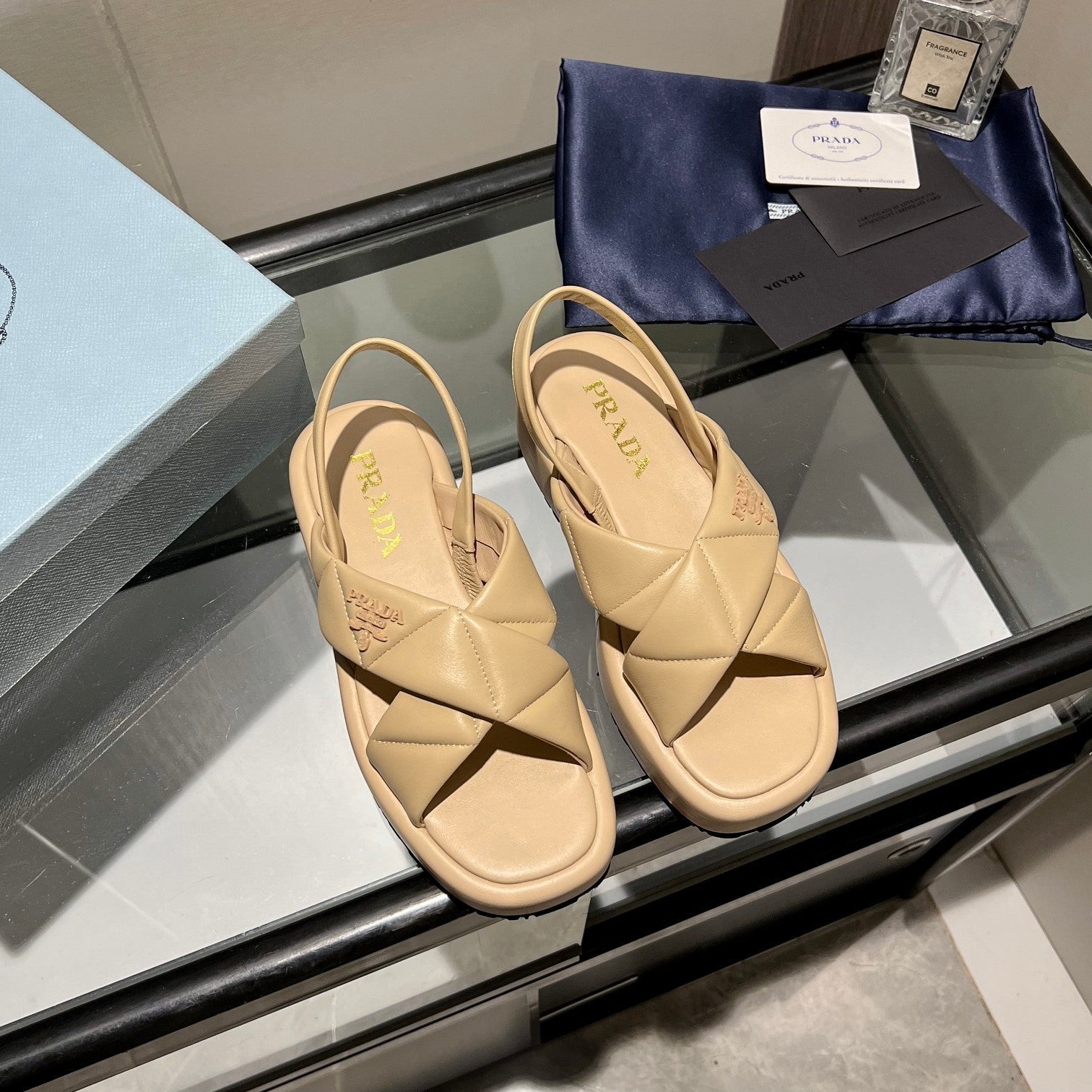 PRADA PADDED CRISSCROSS SANLS BEIGE LAMBSKIN