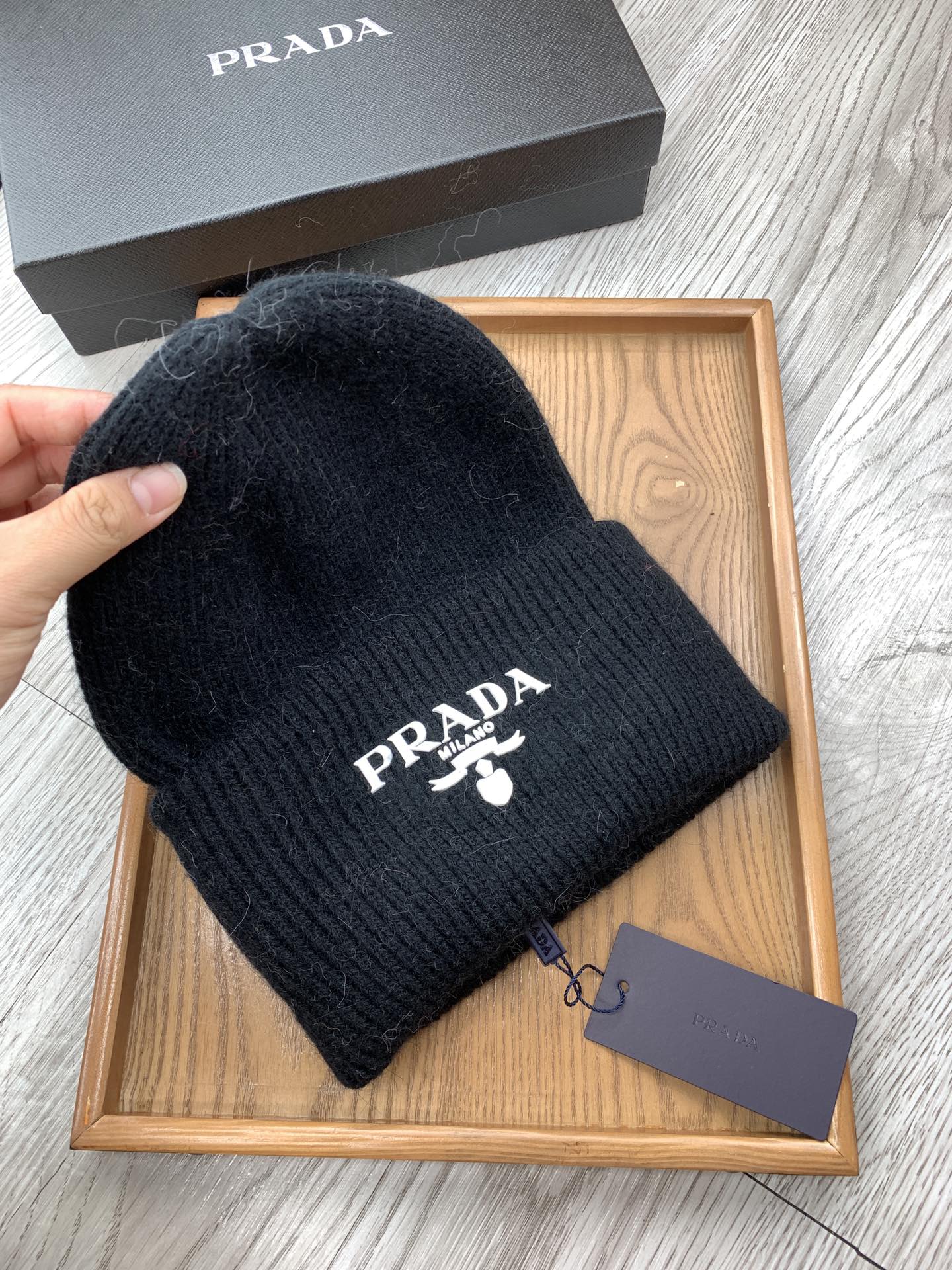 PRADA BEANIE HAT IN BLACK WOOL 108753