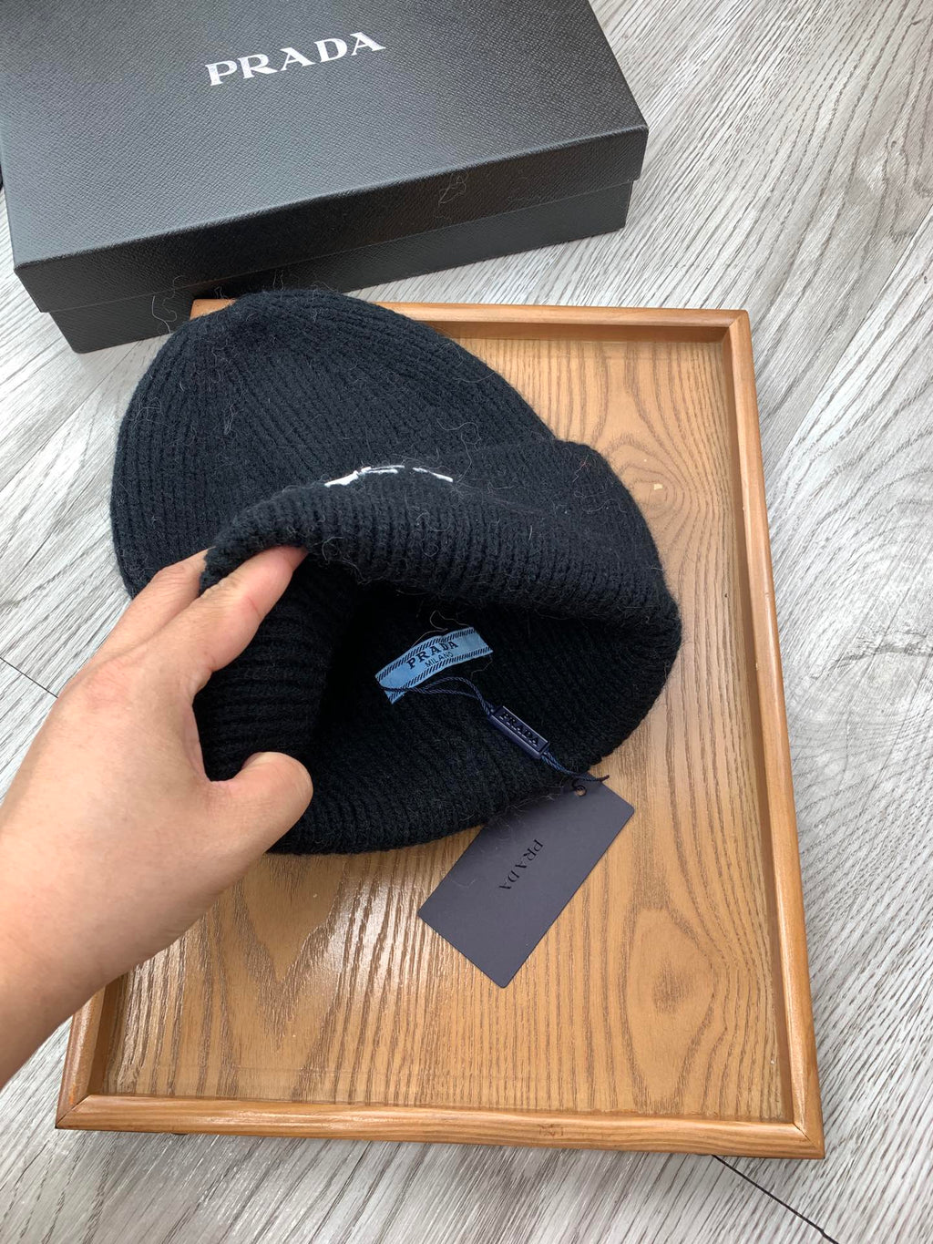 PRADA BEANIE HAT IN BLACK WOOL 108753