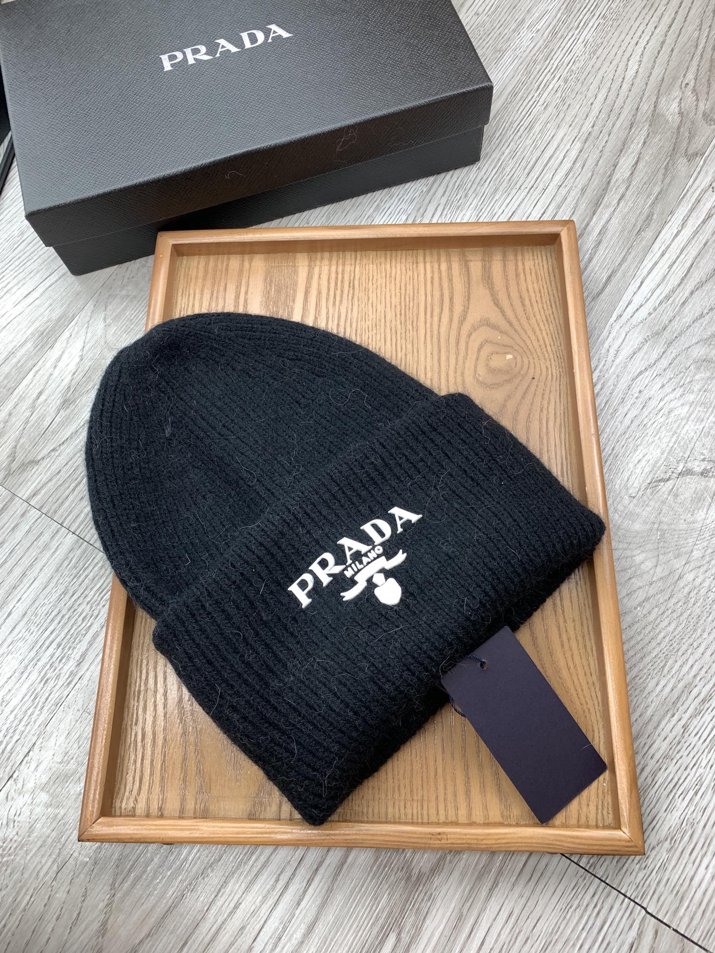 PRADA BEANIE HAT IN BLACK WOOL 108753