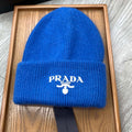 PRADA BEANIE HAT IN COBALT BLUE WOOL 108752