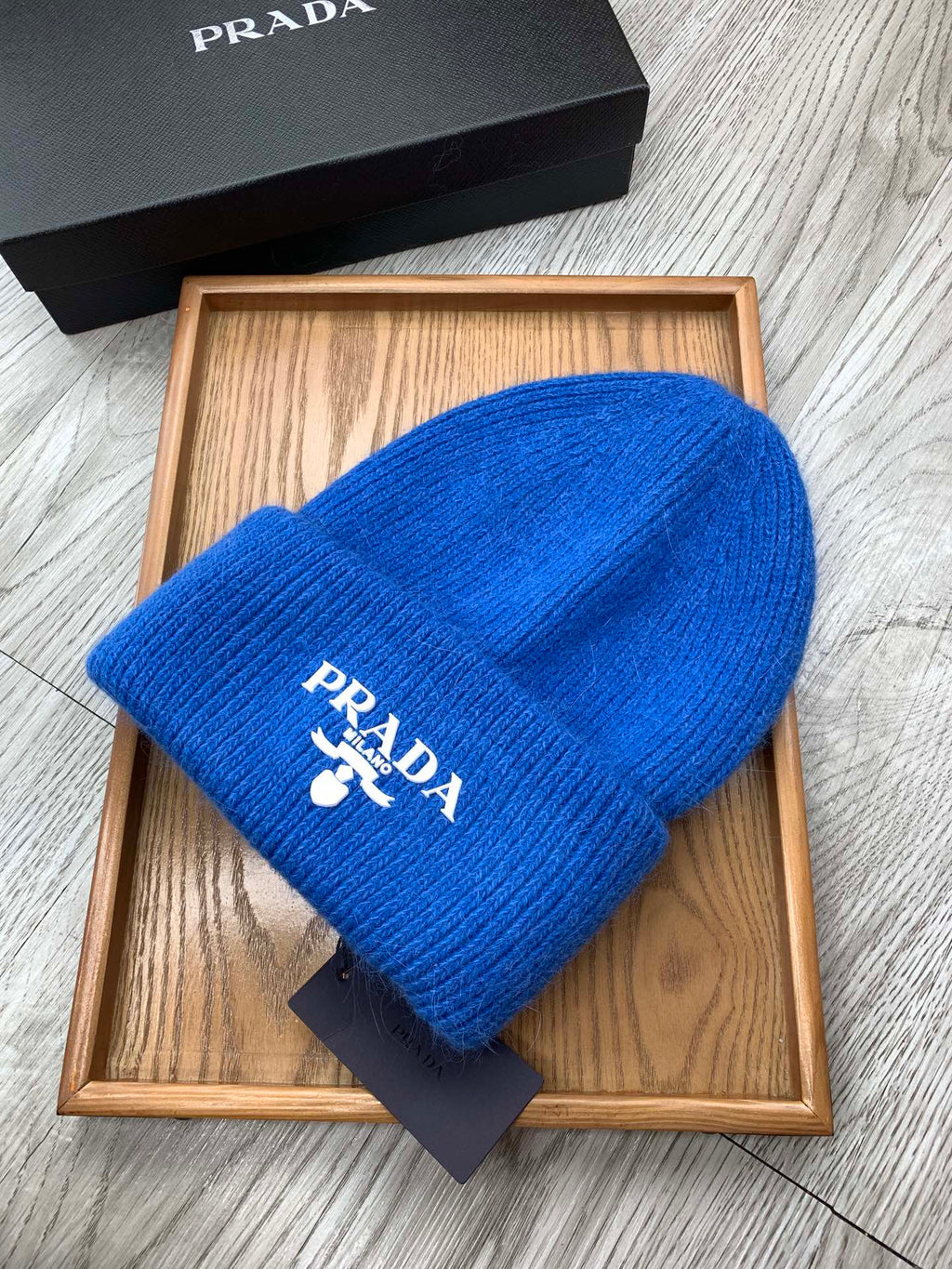 PRADA BEANIE HAT IN COBALT BLUE WOOL 108752