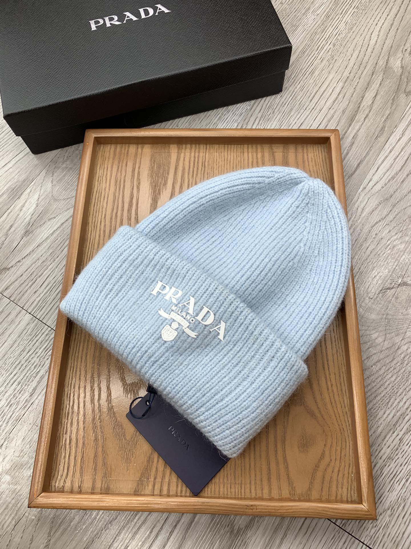 PRADA BEANIE HAT IN LIGHT BLUE WOOL 108744