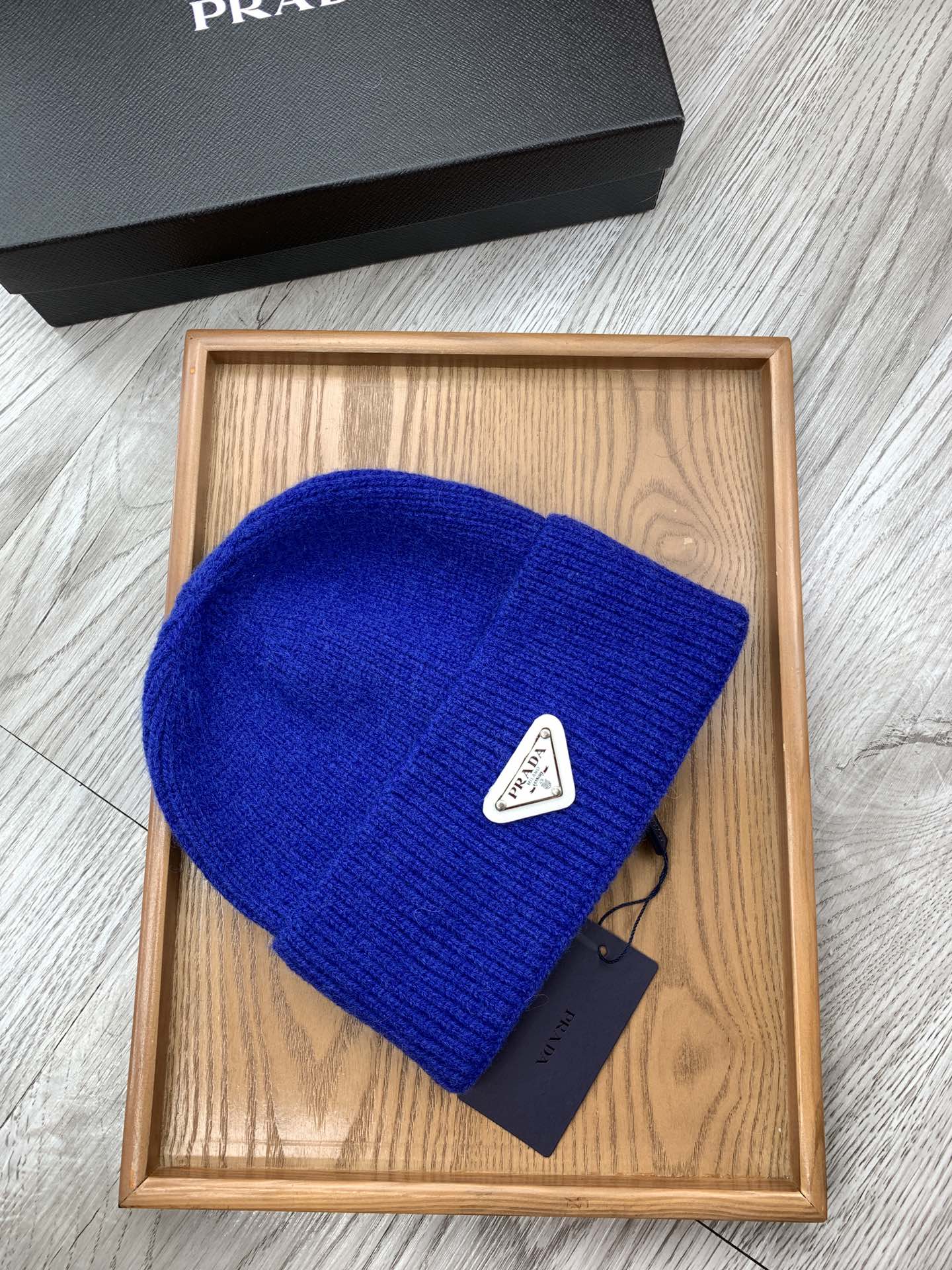 PRADA BEANIIE HAT IN AZURE BLUE WOOL 335033