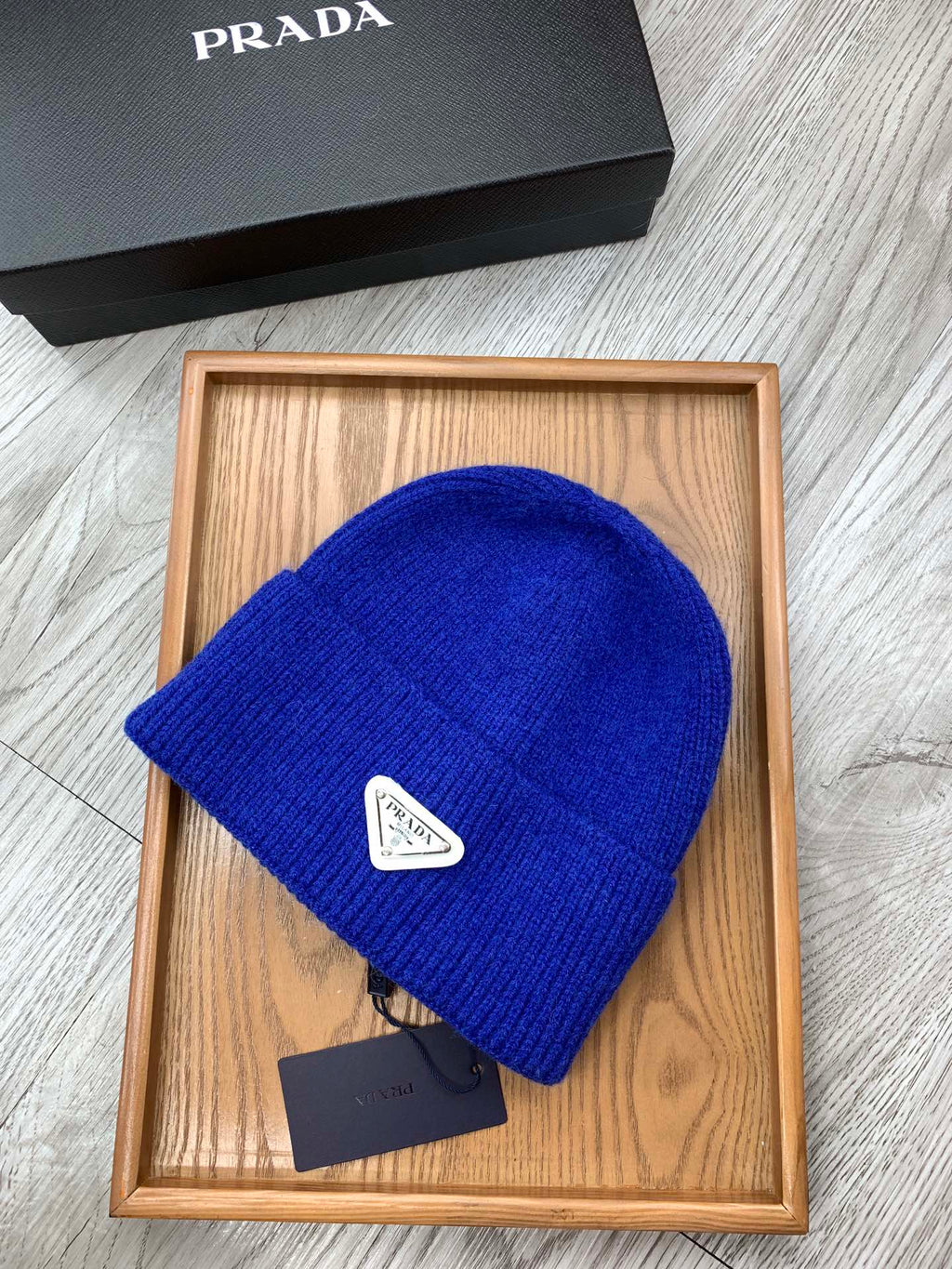 PRADA BEANIIE HAT IN AZURE BLUE WOOL 335033
