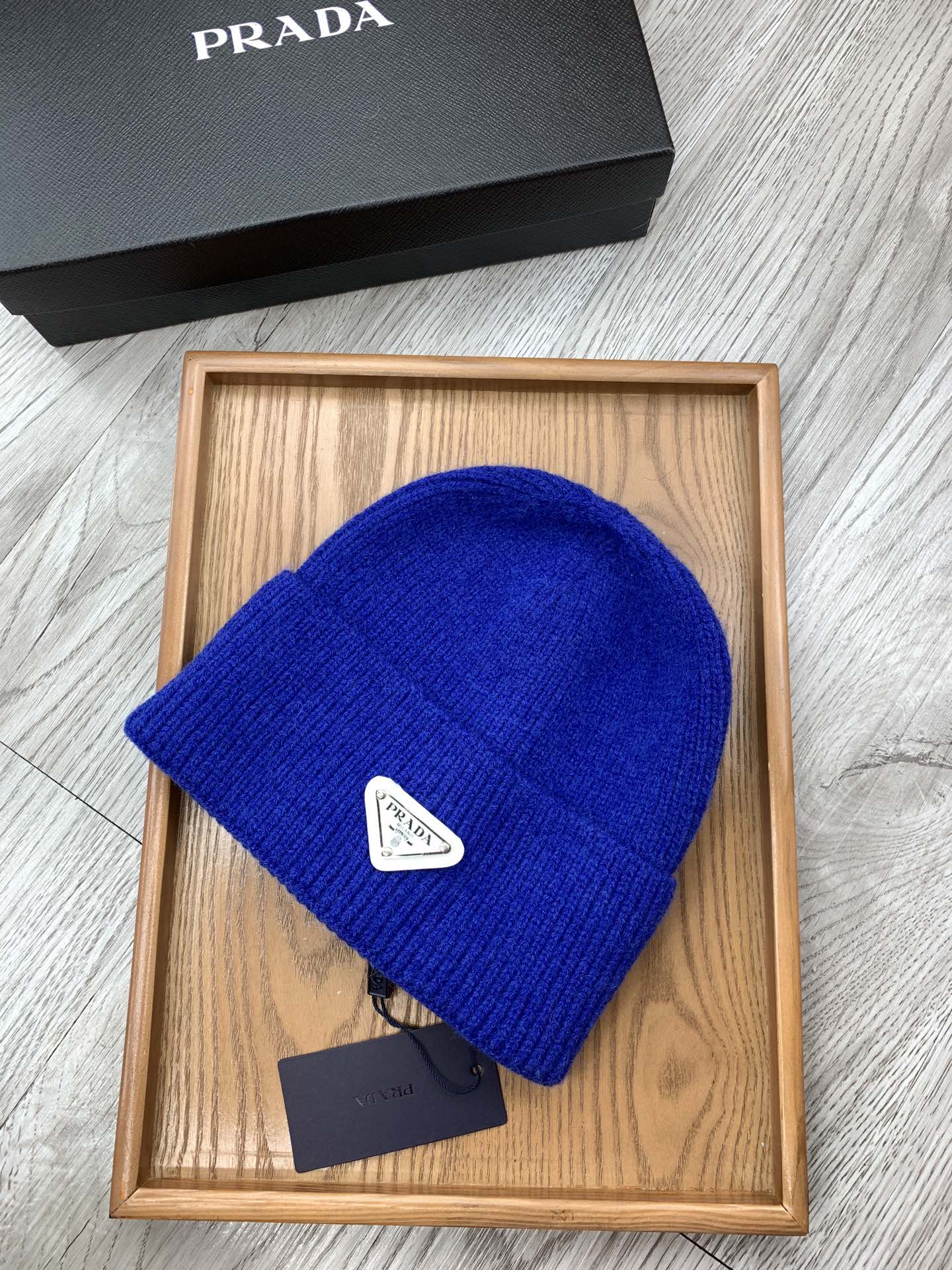 PRADA BEANIIE HAT IN AZURE BLUE WOOL 335033