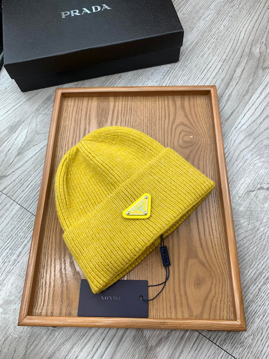 PRADA BEANIIE HAT IN CLASSIC YELLOW WOOL 335035