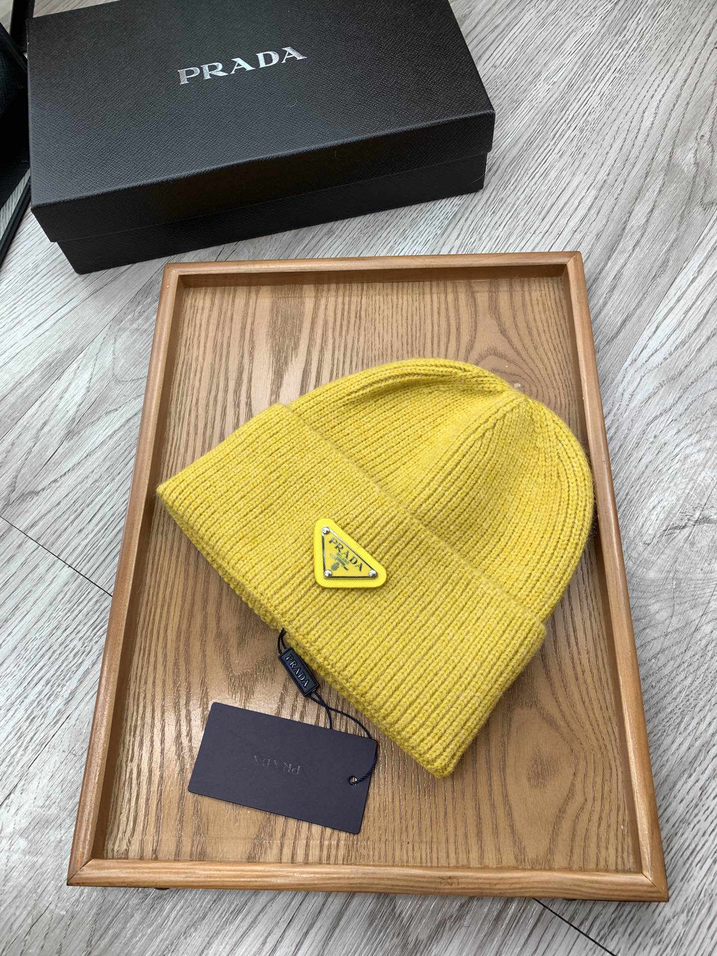 PRADA BEANIIE HAT IN CLASSIC YELLOW WOOL 335035