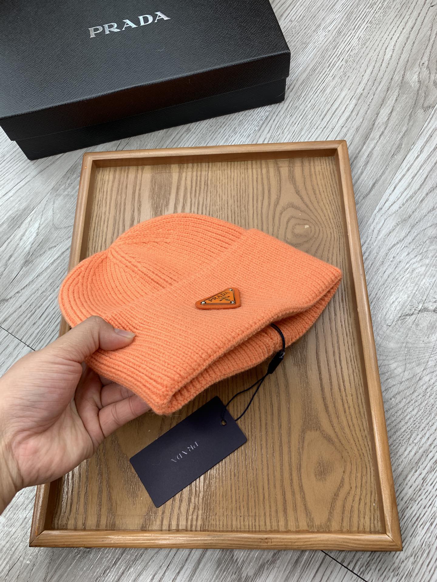 PRADA BEANIIE HAT IN CARROT ORANGE WOOL 335036