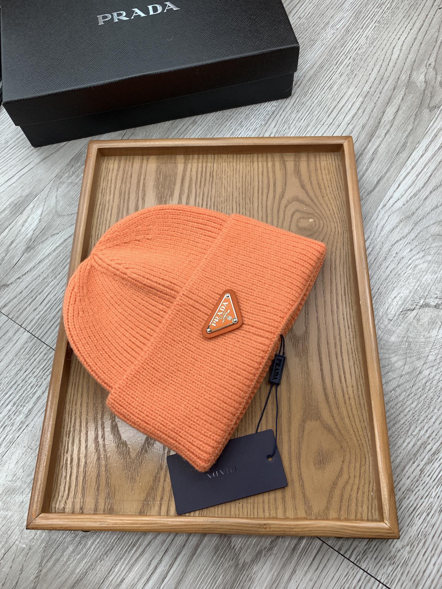 PRADA BEANIIE HAT IN CARROT ORANGE WOOL 335036