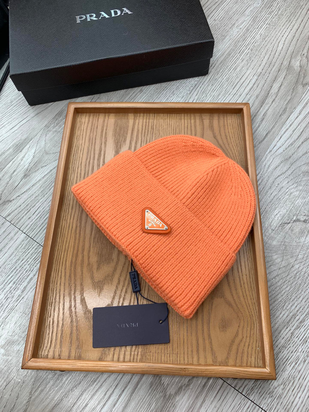 PRADA BEANIIE HAT IN CARROT ORANGE WOOL 335036
