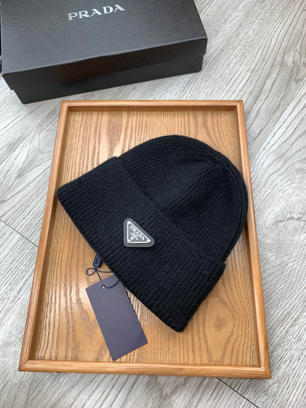 PRADA BEANIIE HAT IN BLACK WOOL 335039