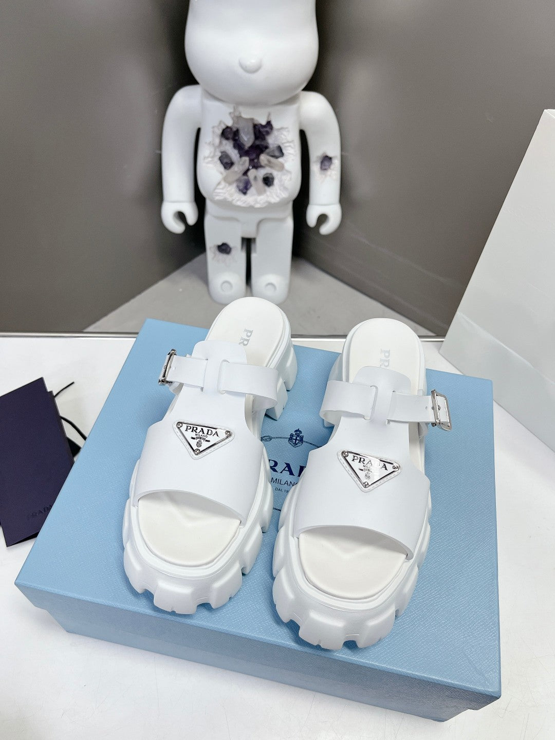 PRADA MONOLITH SLIPPER SANLS IN WHITE RUBBER