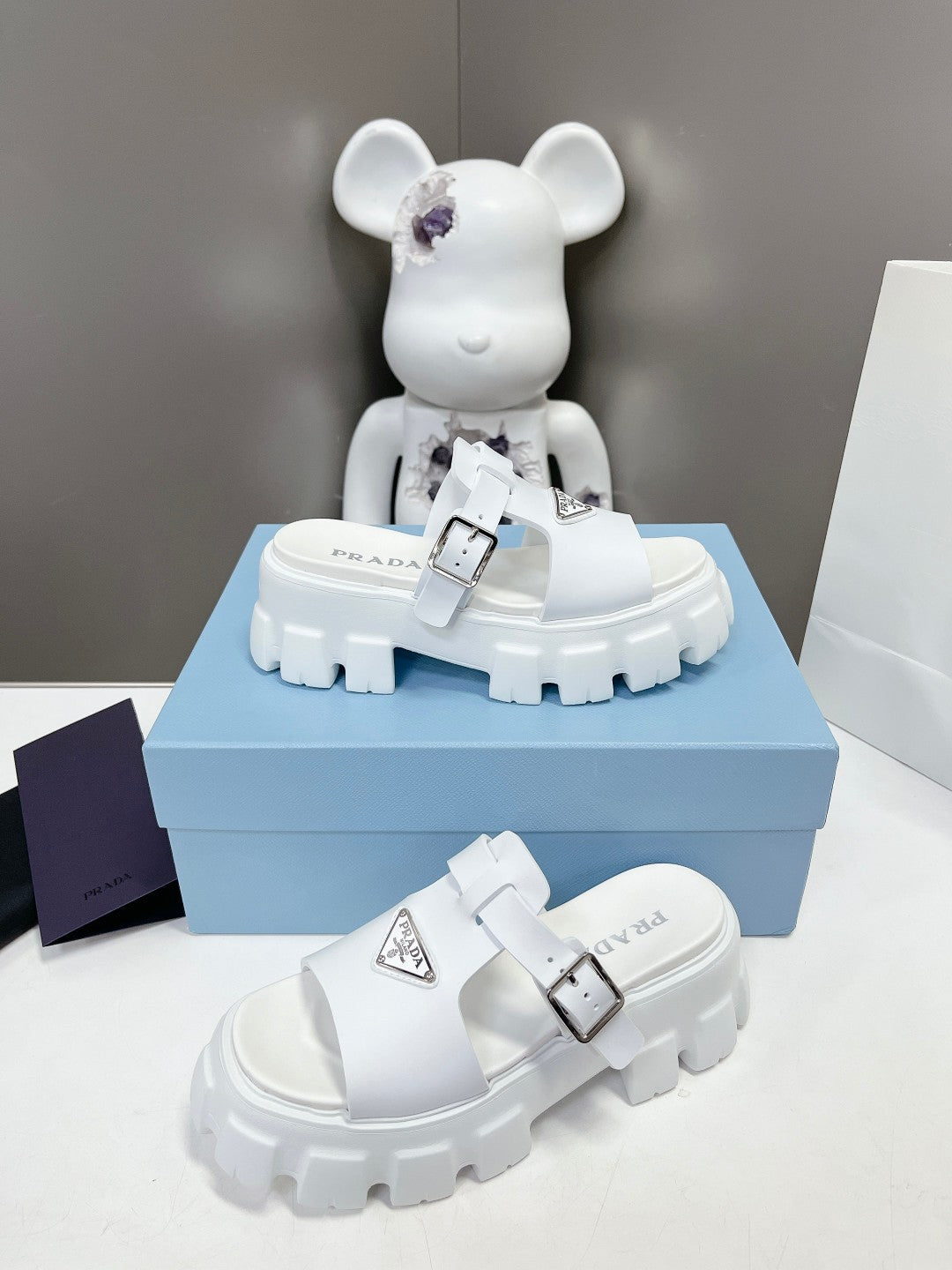 PRADA MONOLITH SLIPPER SANLS IN WHITE RUBBER