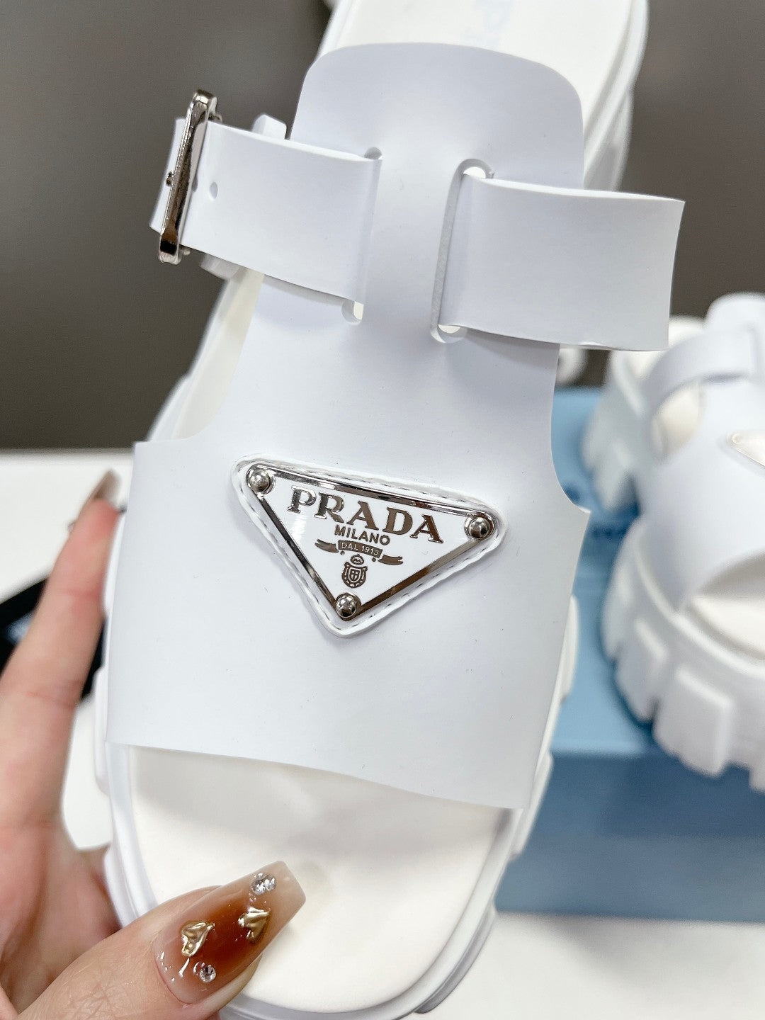 PRADA MONOLITH SLIPPER SANLS IN WHITE RUBBER