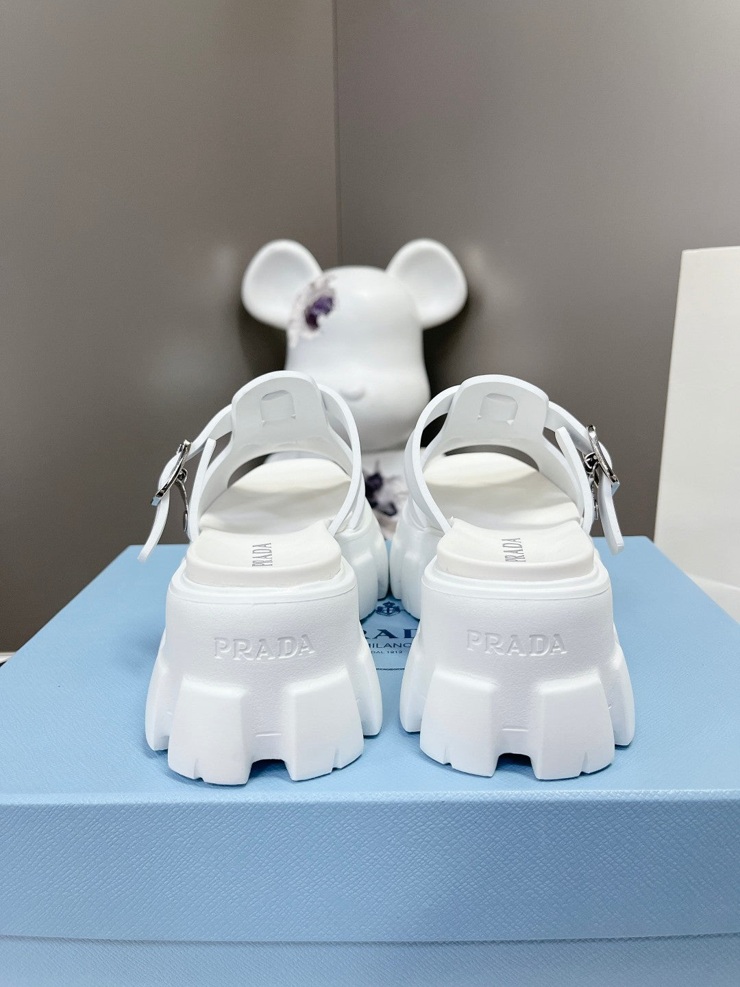PRADA MONOLITH SLIPPER SANLS IN WHITE RUBBER