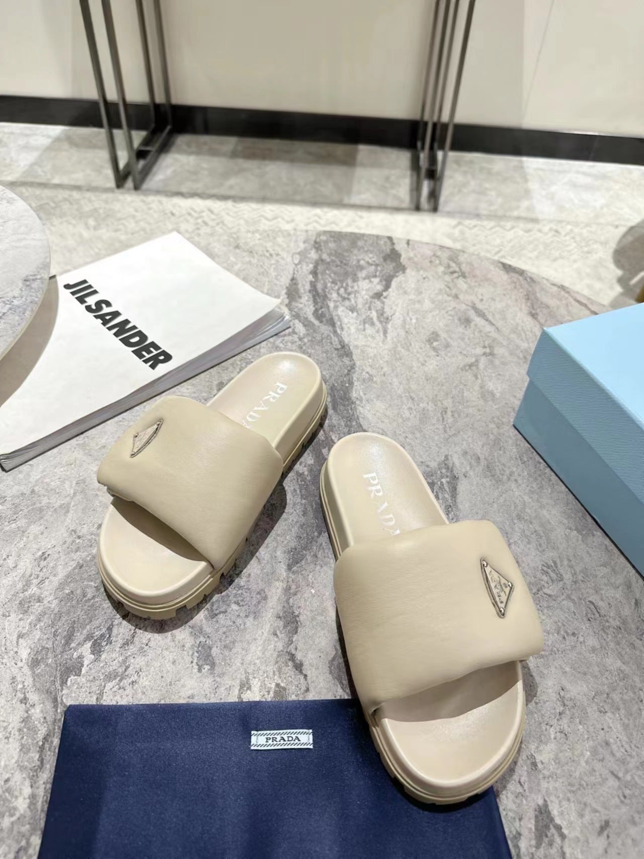 PRADA SHEARLING SLIDES CREAMY WHITE LAMBSKIN