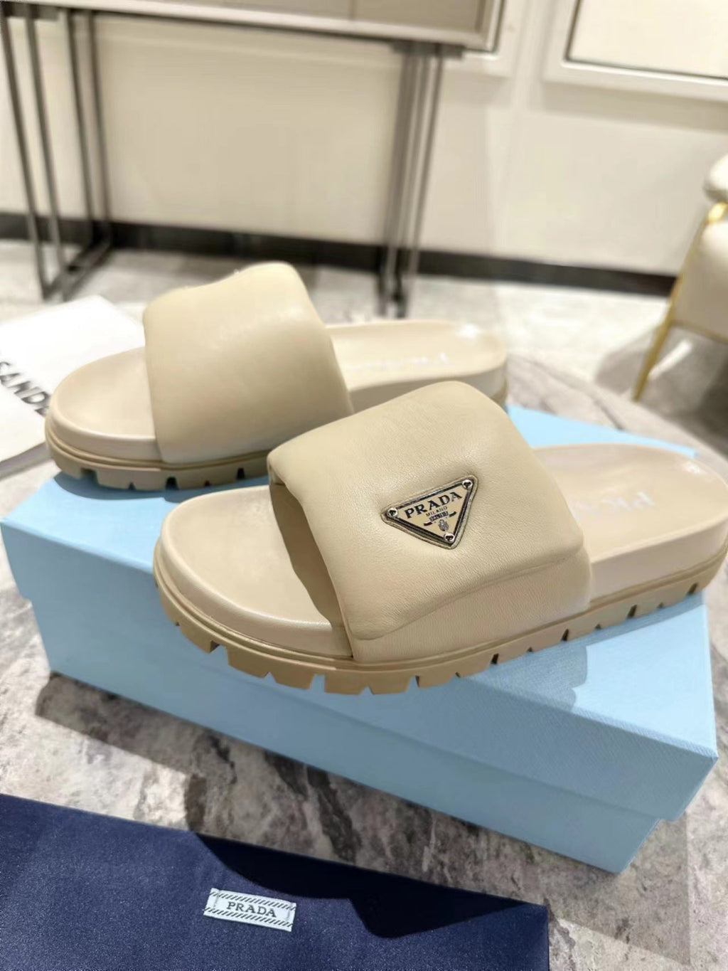 PRADA SHEARLING SLIDES CREAMY WHITE LAMBSKIN