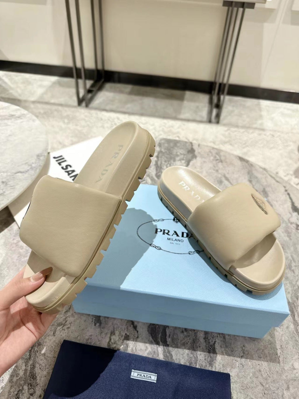 PRADA SHEARLING SLIDES CREAMY WHITE LAMBSKIN