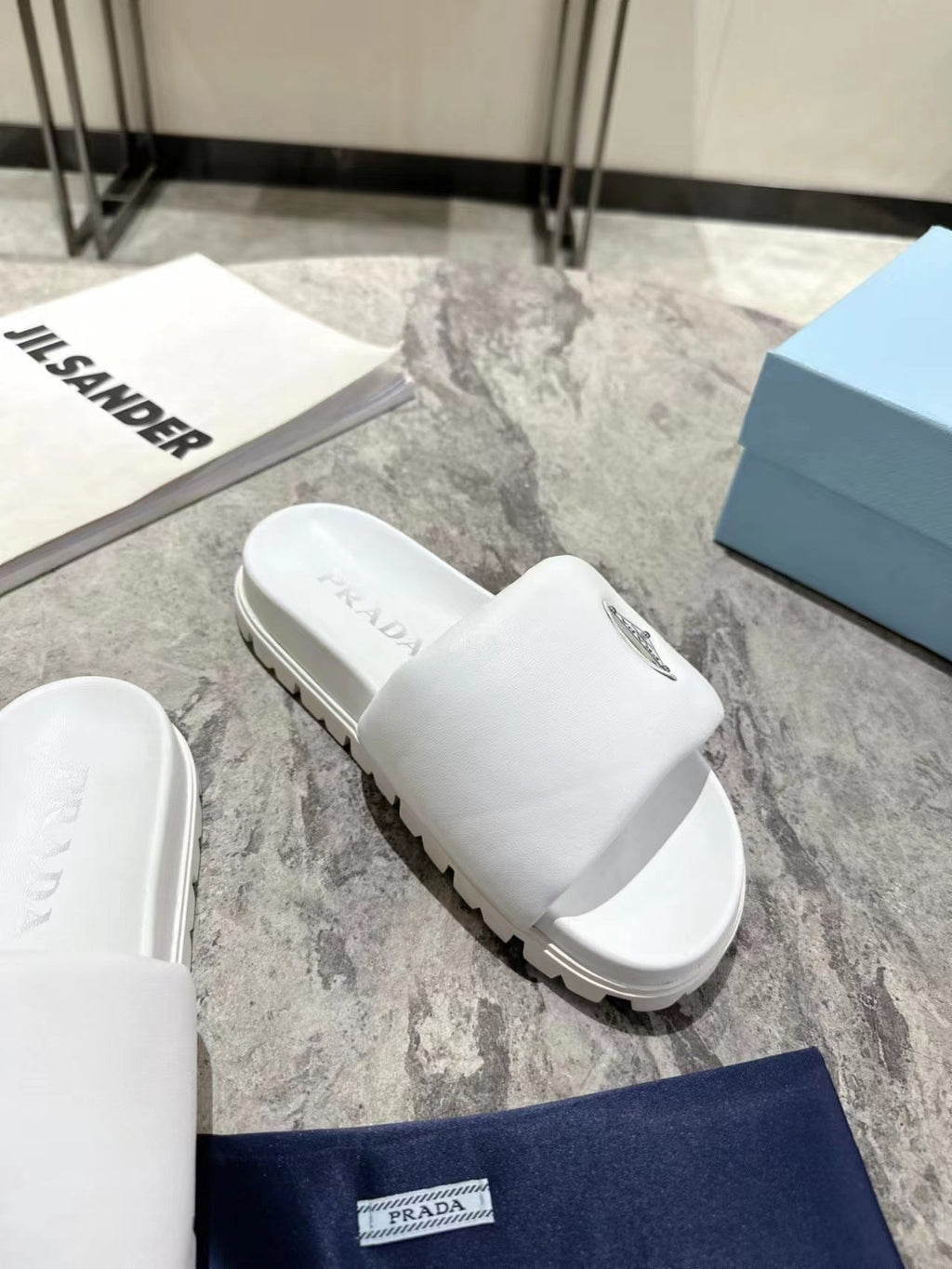 PRADA SHEARLING SLIDES WHITE LAMBSKIN