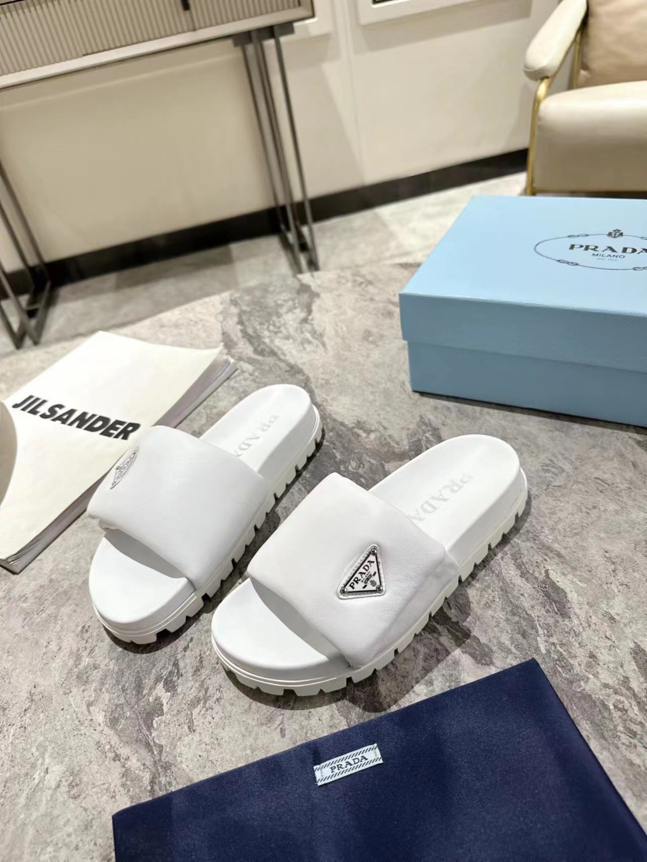 PRADA SHEARLING SLIDES WHITE LAMBSKIN