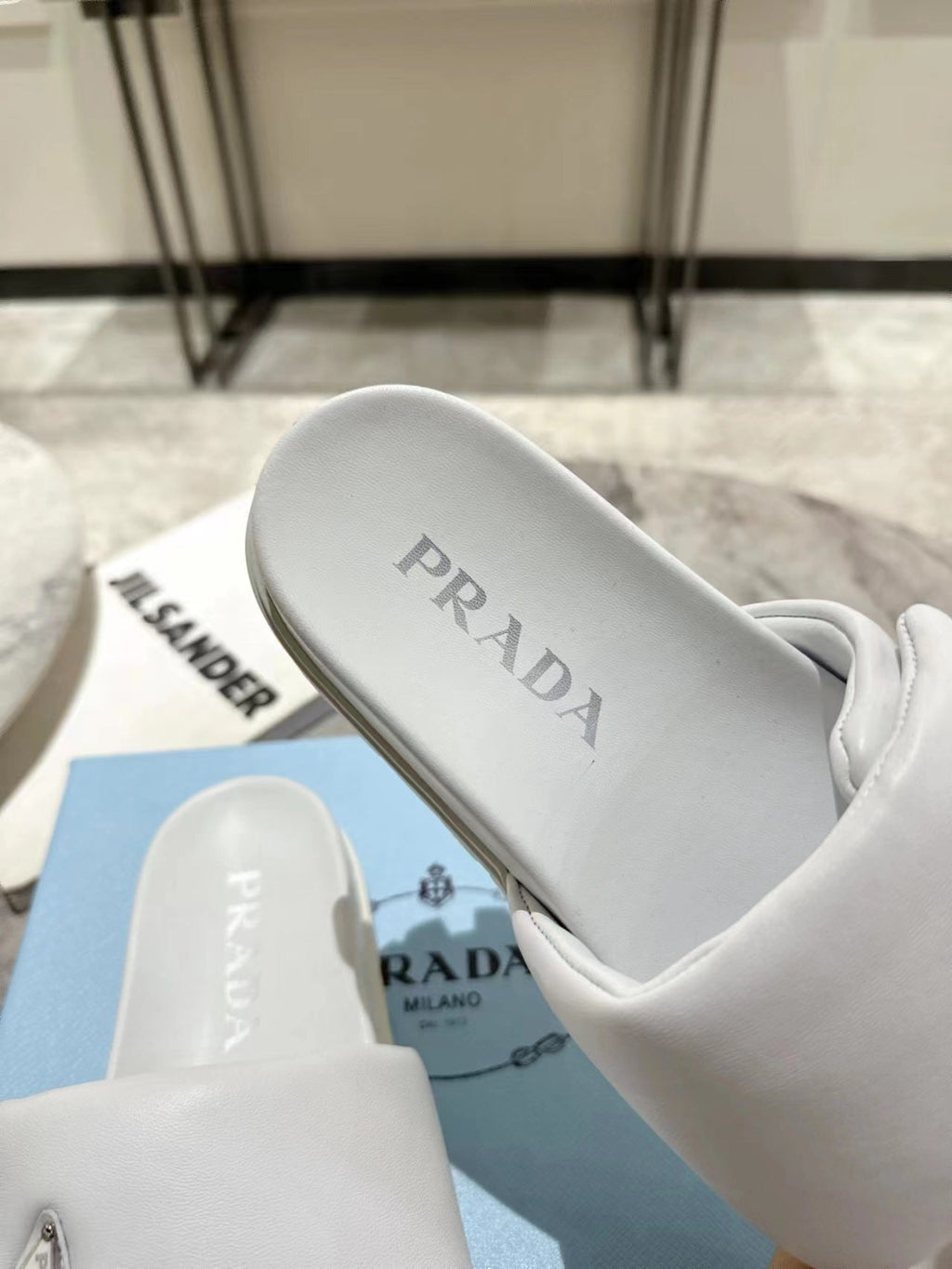 PRADA SHEARLING SLIDES WHITE LAMBSKIN