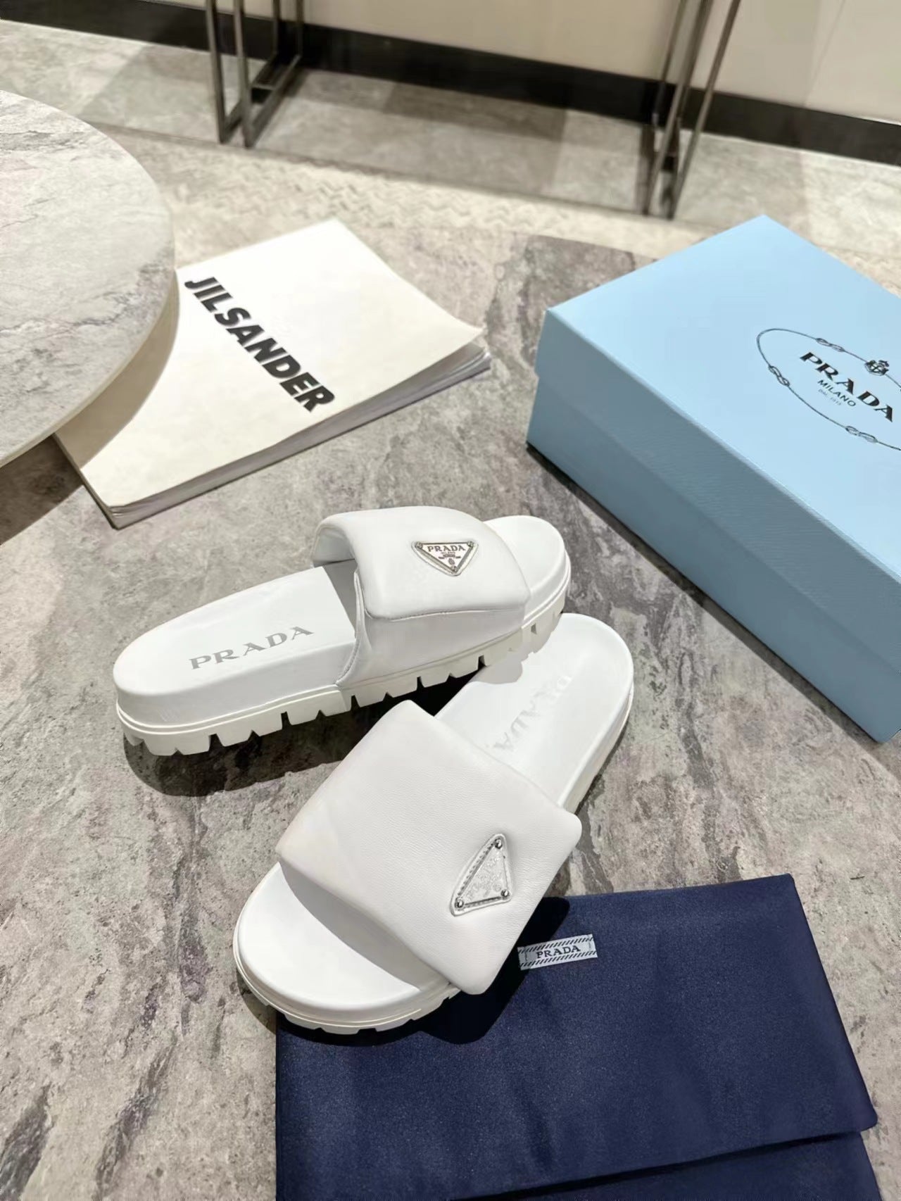 PRADA SHEARLING SLIDES WHITE LAMBSKIN